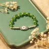 Bracelet ‘Abondance’ Avec Mauvais Oeil En Péridot 2 Bracelet ‘Abondance’ Avec Mauvais Oeil En Péridot -Moment Ici bracelet abondance avec mauvais oeil en peridot 4