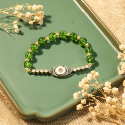 Bracelet ‘Abondance’ Avec Mauvais Oeil En Péridot